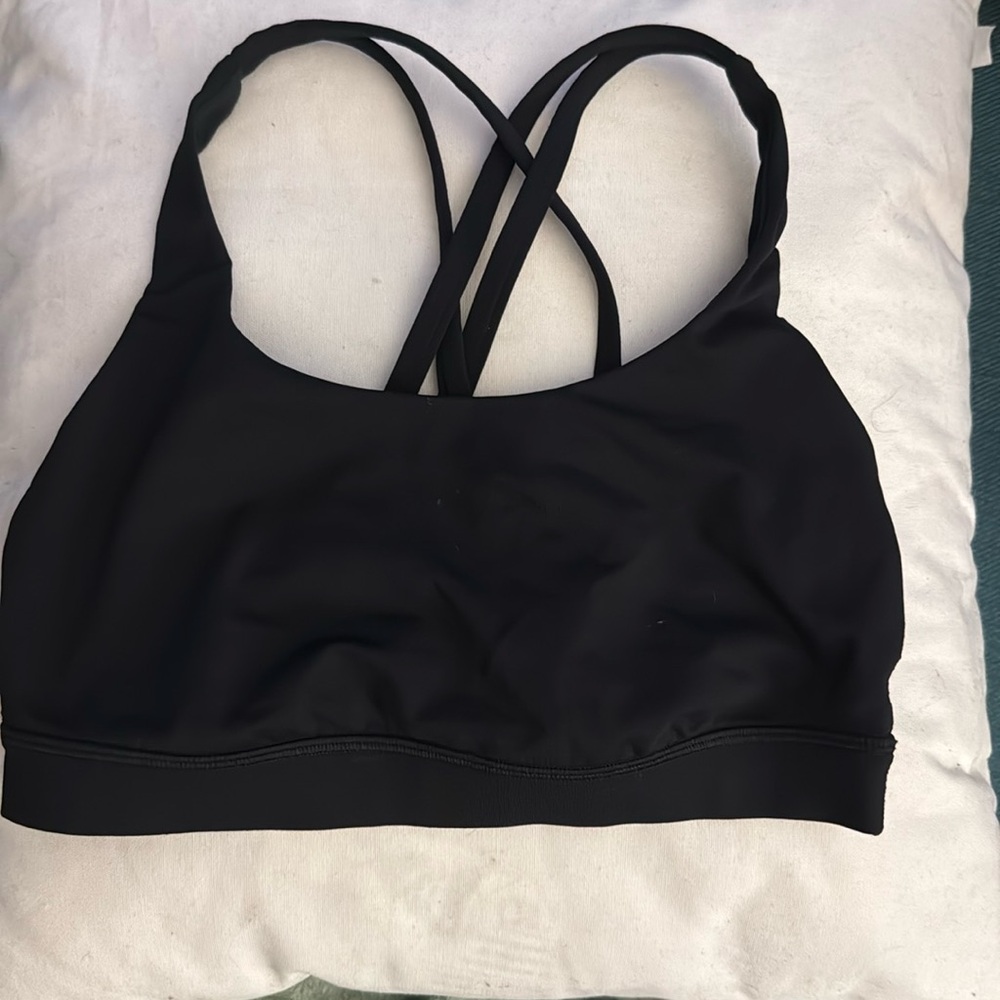 XS black lululemon sports bra size small with criss cross straps.